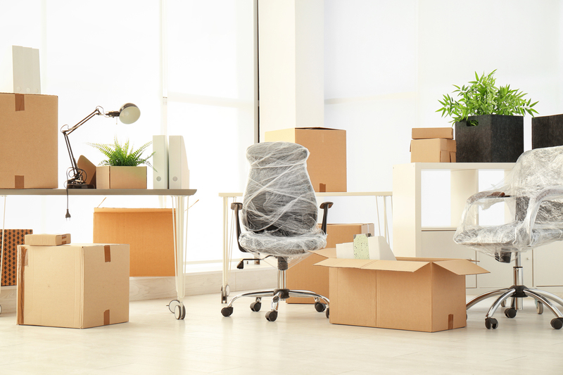 dreamstime_s_114513024 packaged office chairs and boxes
